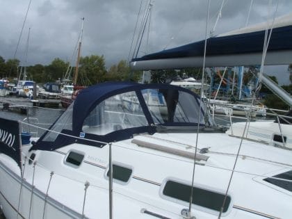 Beneteau Oceanis 323 custom sprayhood with stainless steel frame and durable marine fabric
