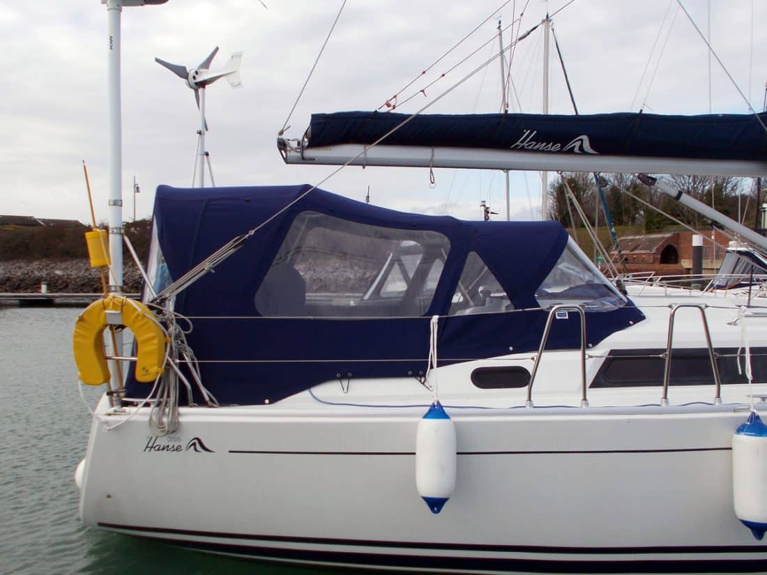 Hanse 355 Cockpit Enclosure fitted to a Tecsew recover Sprayhood for Covercraft original