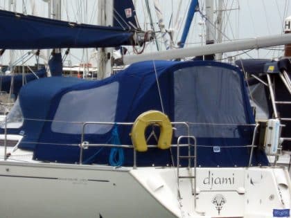 dufour 385 cockpit enclosure fitted to tecsew standard sprayhood 3