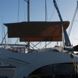 Beneteau Antares 30 Flybridge Bimini shown with optional side shade panels_9
