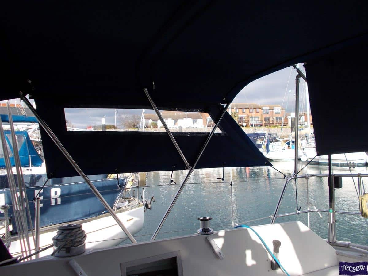 Sadler 34 Bimini with zip attached side shade panels windows and fwd