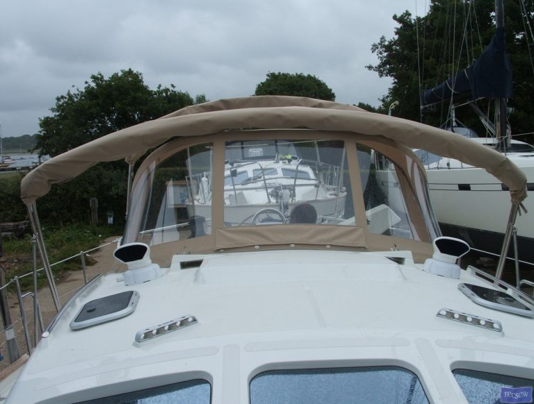 Southerly 110, 3 part Bimini with high model sprayhood_10