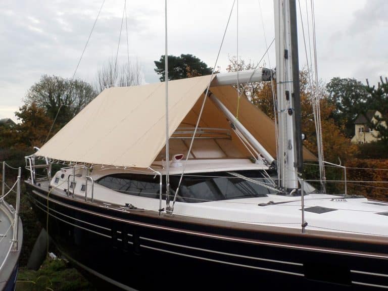 Tecsew boom tent fitted on a yacht, offering cockpit protection with premium marine fabric and custom fit.