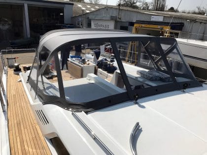Beneteau Oceanis 51.1, model with NO ARCH, Sprayhood conventional design with NO zipped removable sides front 2