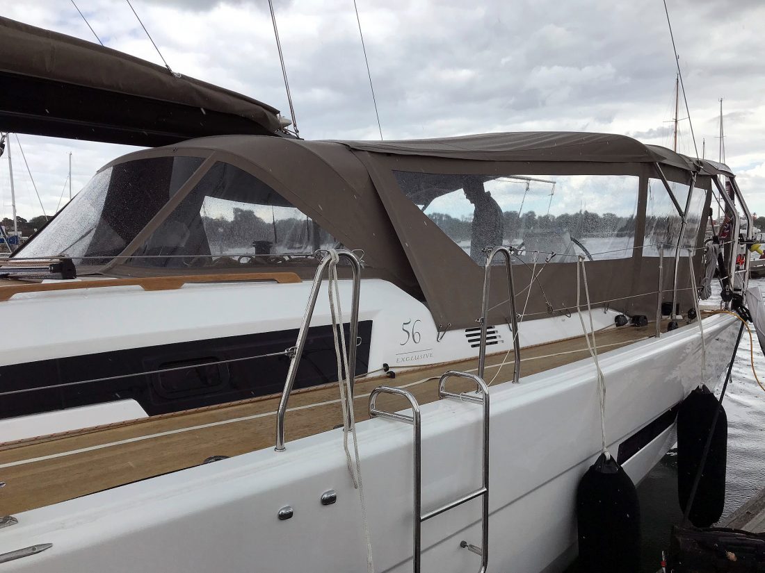Dufour 56 Bimini utilising fixed gantry with the addition of Sprayhood connection panel and side panels