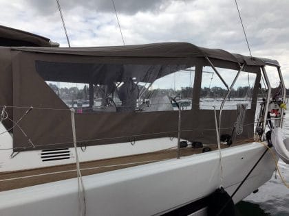 Dufour 56 Bimini utilising fixed gantry with addition of Sprayhood connection panel and side panels left side 2