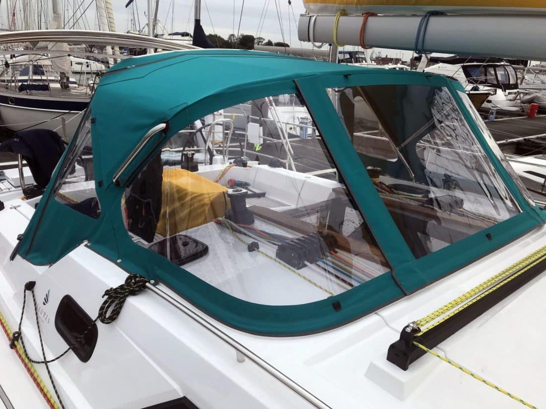 Sprayhood welded side grab handles shown on an Allures 45.9 Sprayhood