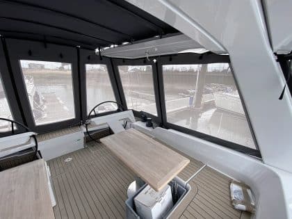 Interchangeable Soltis mesh and Renolit window panels on Hanse 460 HT cockpit enclosure.