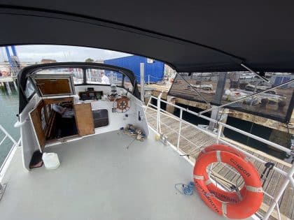Westbank 38 Bimini shown with optional Side Shade Panels