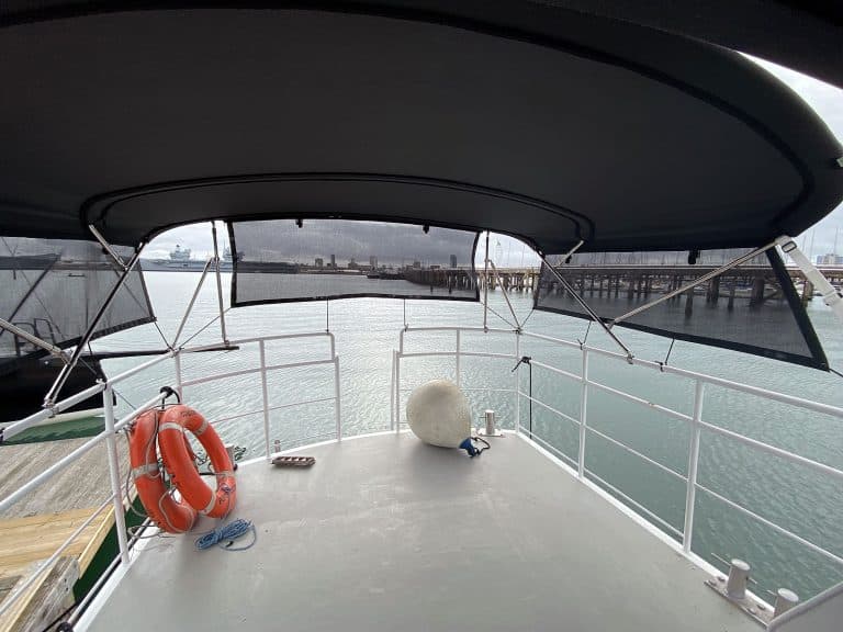 Westbank 38 Bimini shown with optional Side Shade Panels