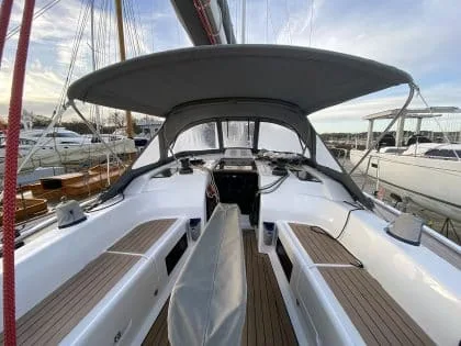 Andy B, owner of a Dehler 46SQ at Premier Universal Marina, praises Tecsew for their impressive survey and precise solution for a helm bimini and spray dodger extension.