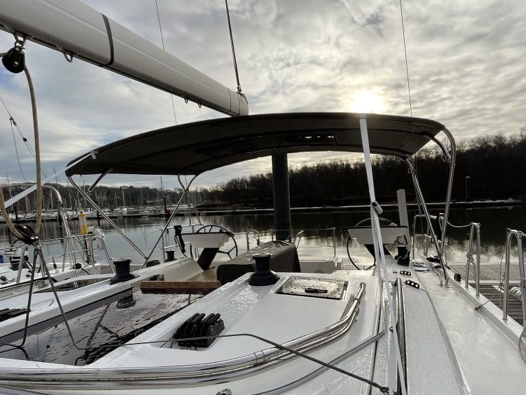Dufour 41 with Tecsew’s standard bimini installed, featuring a polished stainless steel frame and durable Sunbrella fabric.