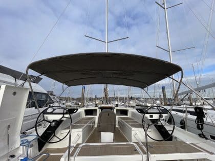 Dufour 41 with Tecsew’s standard bimini installed, featuring a polished stainless steel frame and durable Sunbrella fabric.