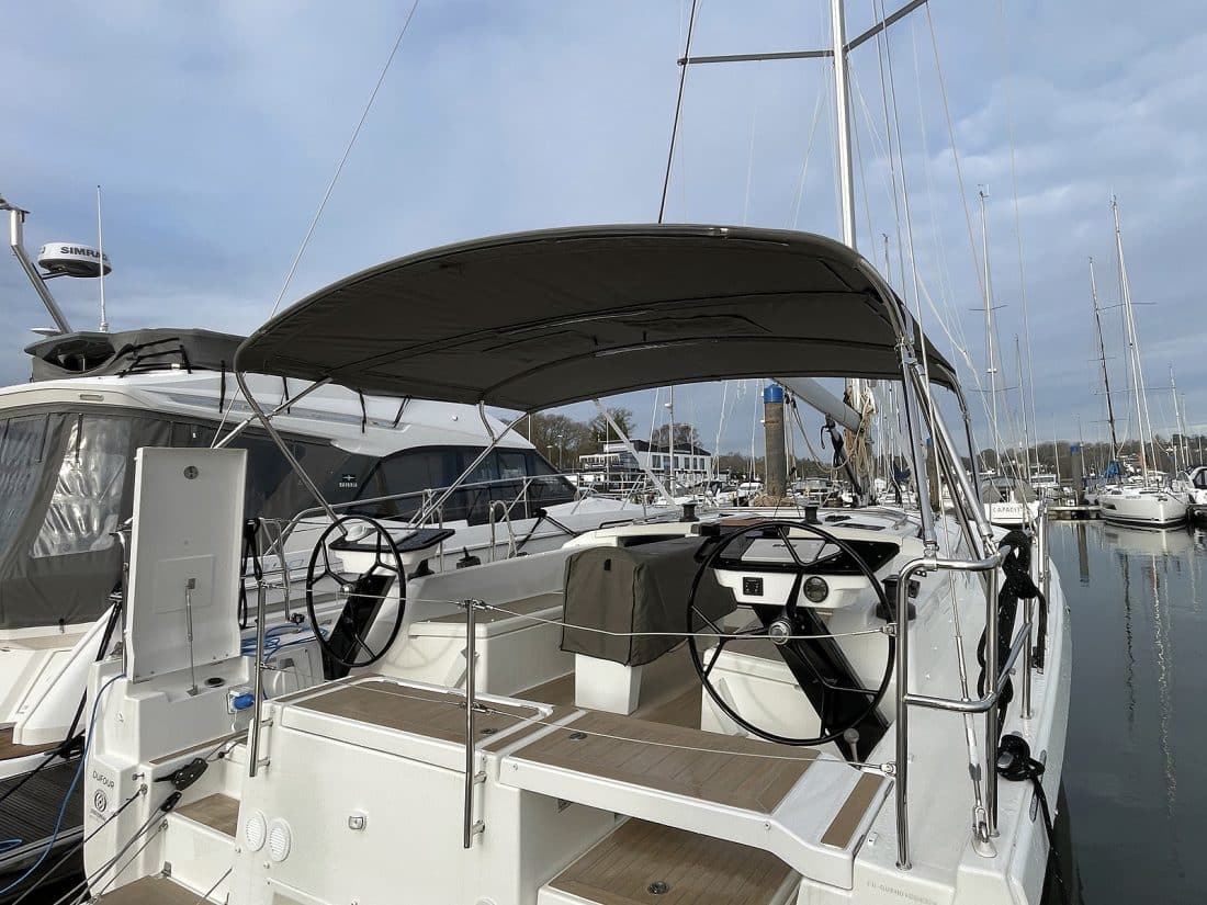 Dufour 41 with Tecsew’s standard bimini installed, featuring a polished stainless steel frame and durable Sunbrella fabric.