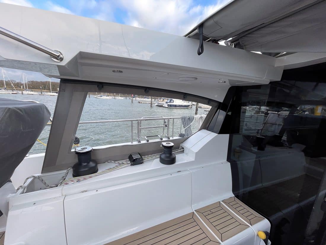 Moody 48DS Cockpit Enclosure Side Panels with Sunbrella fabric and weather-resistant zips.