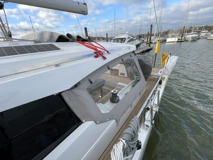 Moody 48DS Cockpit Enclosure Side Panels with Sunbrella fabric and weather-resistant zips.