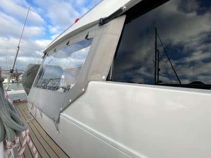 Moody 48DS Cockpit Enclosure Side Panels with Sunbrella fabric and weather-resistant zips.