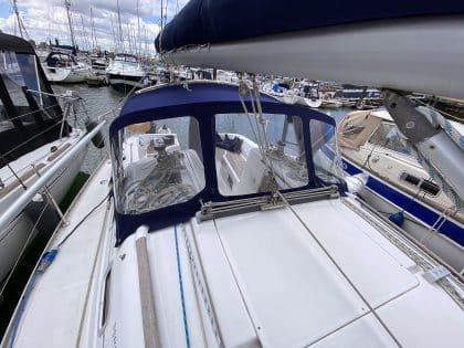 Sprayhood recover for Beneteau Oceanis 323 ROSEBUD in Factory Original Type 3 design with Sunbrella fabric and clear windows.