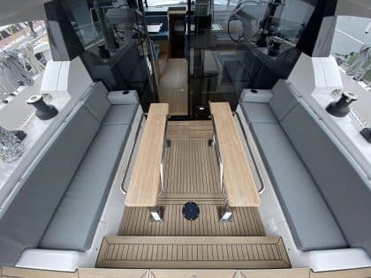 Moody 48 DS cockpit cushions with optional arm rests, cup holders, and contrast piping for added style and comfort.