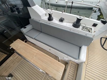 Moody 48 DS cockpit cushions with optional arm rests, cup holders, and contrast piping for added style and comfort.