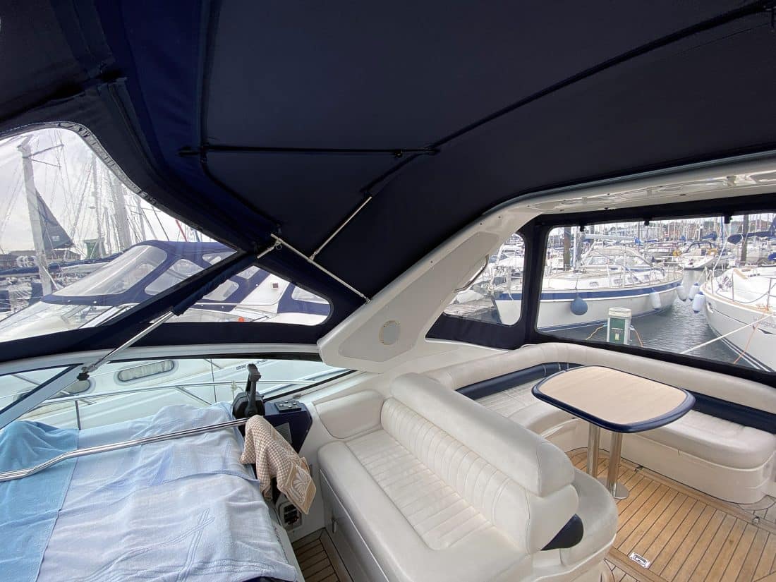 Sealine S34 replacement cockpit canopy for Vin Rouge in Sunbrella fabric with custom fit.