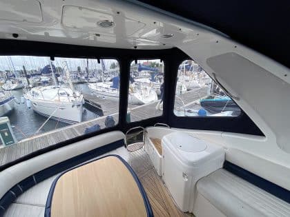 Sealine S34 replacement cockpit canopy for Vin Rouge in Sunbrella fabric with custom fit.