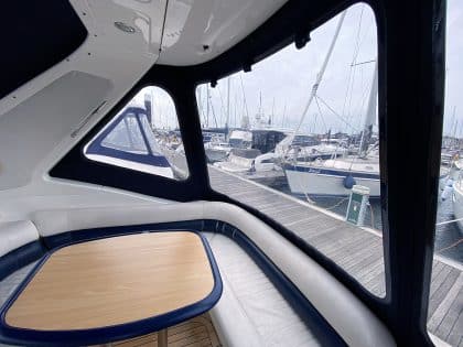 Sealine S34 replacement cockpit canopy for Vin Rouge in Sunbrella fabric with custom fit.