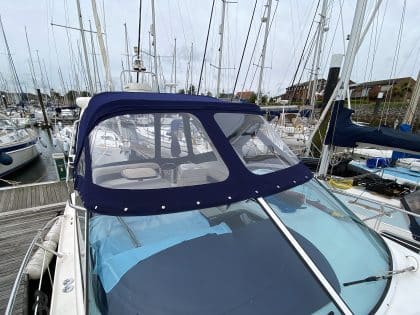 Sealine S34 replacement cockpit canopy for Vin Rouge in Sunbrella fabric with custom fit.