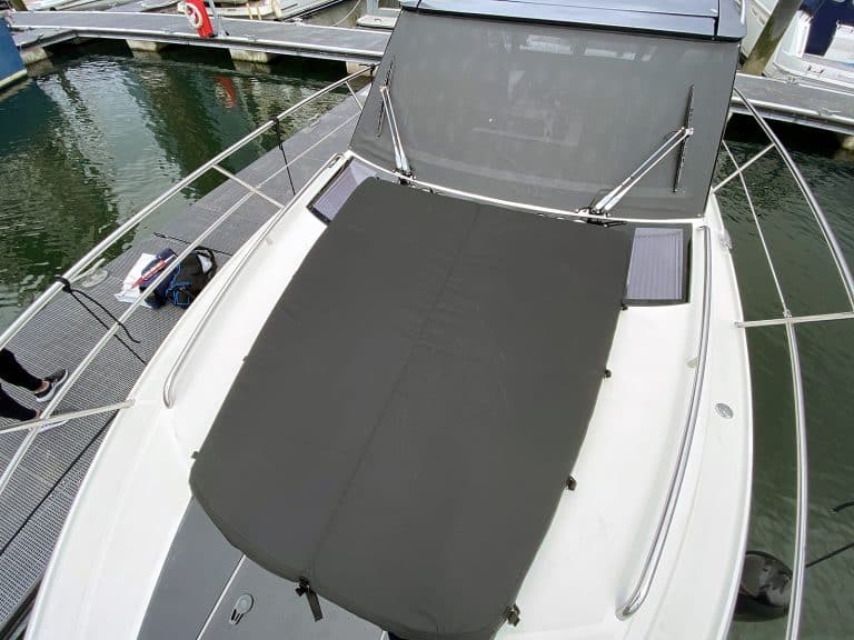 Galeon 335 HTS bow seating cover in Sunbrella fabric for weather and UV protection.