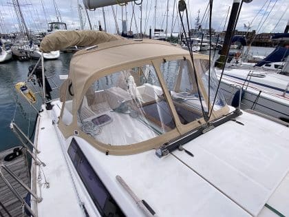 Dufour 375 sprayhood replacement in Sunbrella fabric with Renolit windows for enhanced protection and visibility