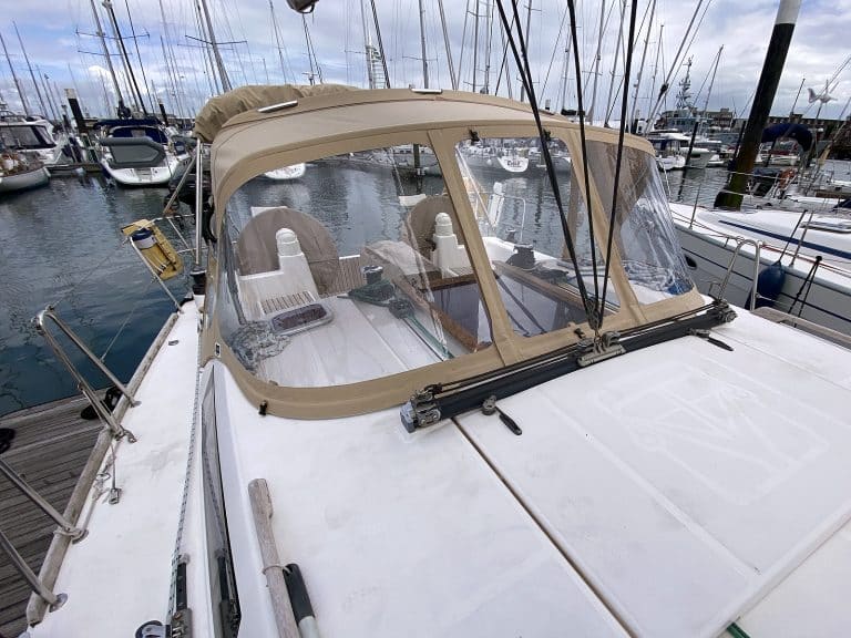 Dufour 375 sprayhood replacement in Sunbrella fabric with Renolit windows for enhanced protection and visibility