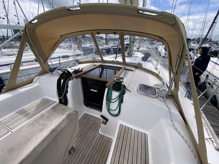 Dufour 375 sprayhood replacement in Sunbrella fabric with Renolit windows for enhanced protection and visibility