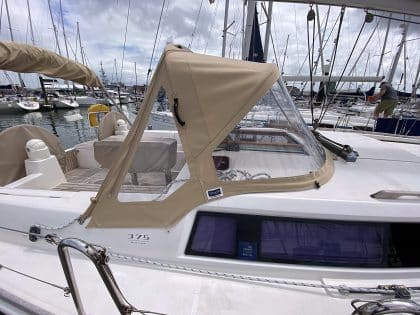 Dufour 375 sprayhood replacement in Sunbrella fabric with Renolit windows for enhanced protection and visibility