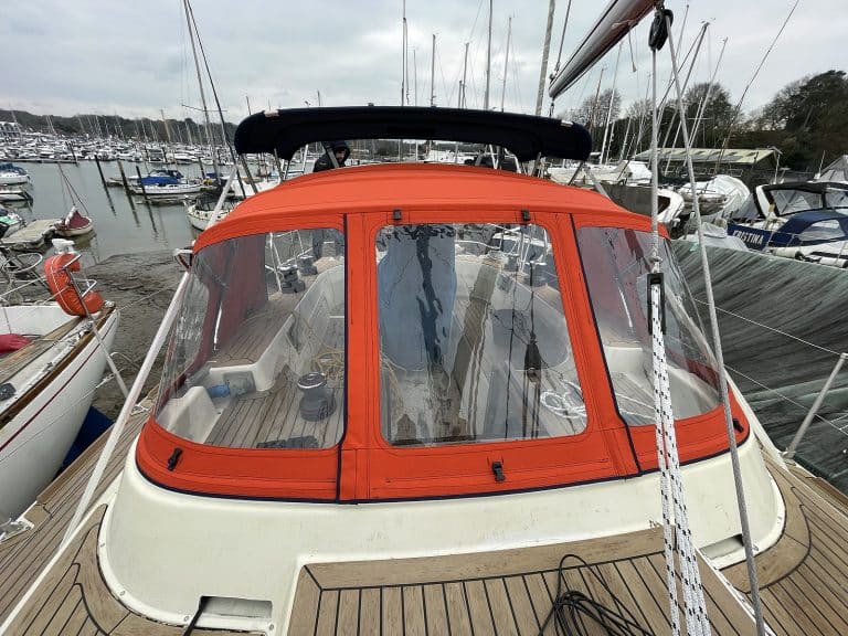 Westerly Corsair with a Tecsew 3-bar sprayhood providing increased cockpit coverage, featuring Paskal No 10 water-repellent zippers.