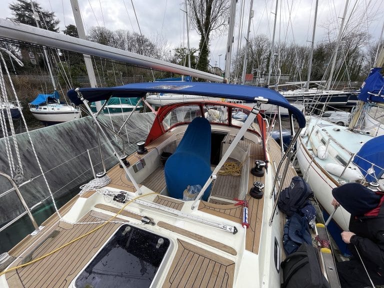 Westerly Corsair with a Tecsew 3-bar bimini providing extended sun protection and a durable stainless frame.